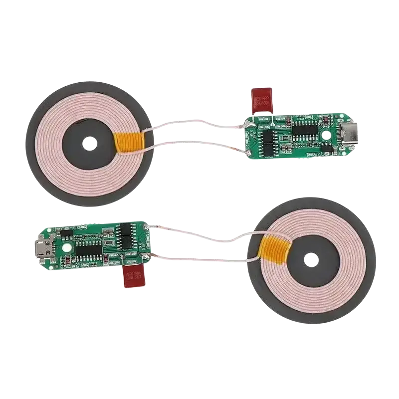 Wireless charger diy transmitter module circuit board with green circuit boards and pink wireless charging coils