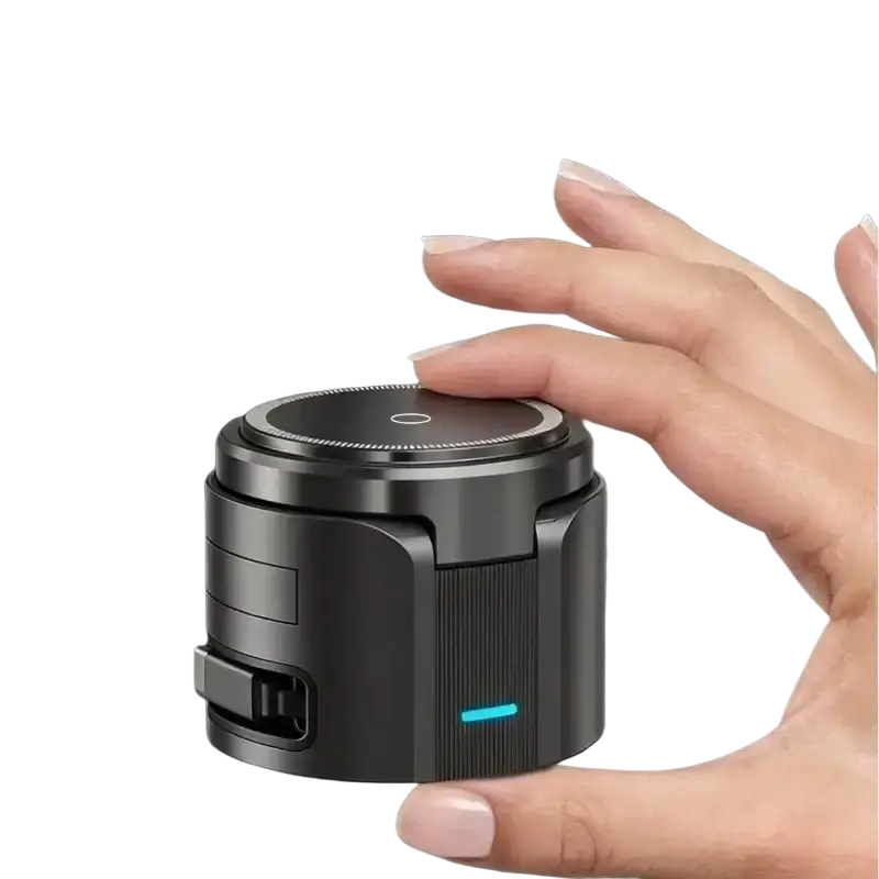 Black cylindrical wireless charger with retractable charging cable, foreign object detection, and blue led indicator light