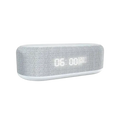 Gray textured fabric wireless charging alarm clock with white digital display showing time and date power saving design