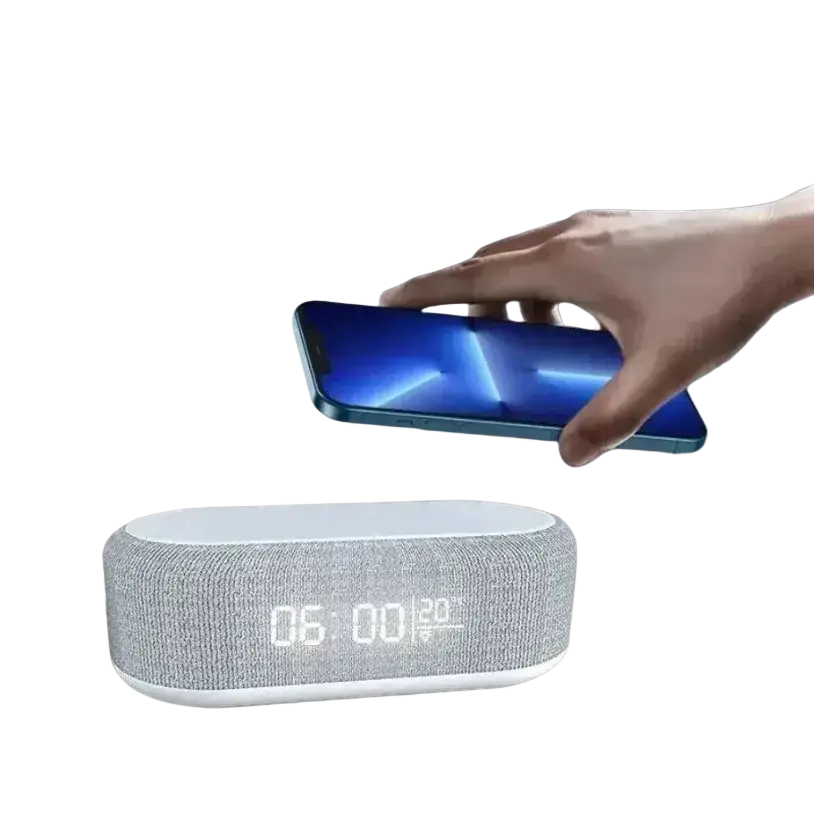 Gray textured fabric wireless charging alarm clock with white digital display showing time and temperature and wireless charging function