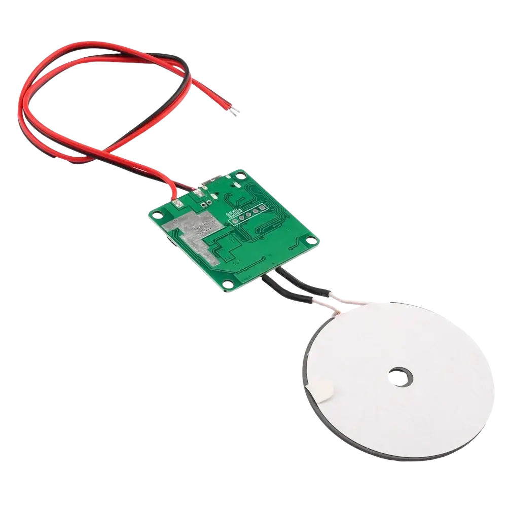 Green circuit board with red and black wires connected to white circular coil for wireless charging fast transmitter module type c