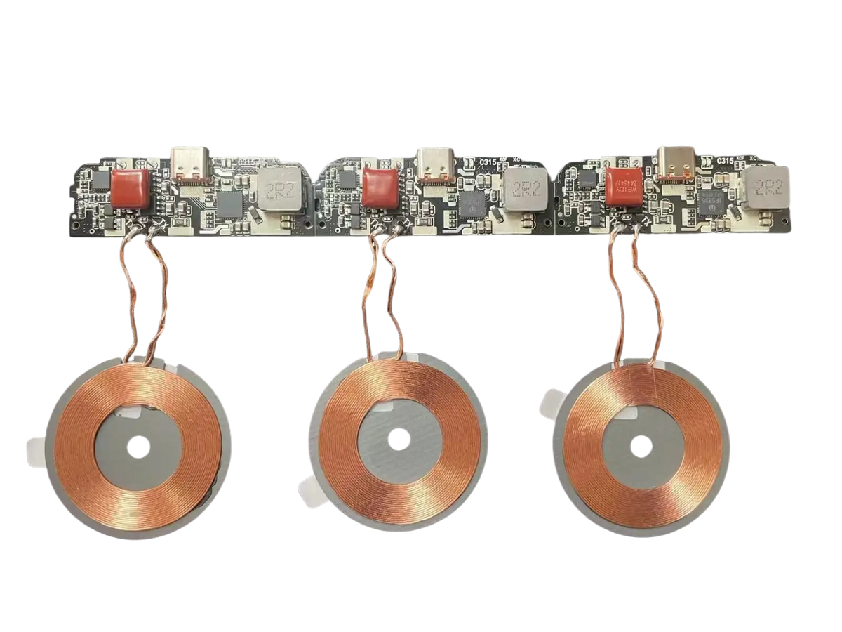 Three copper-colored wireless charging coils with gray bases connected to black pcba circuit board for 15w fast charging
