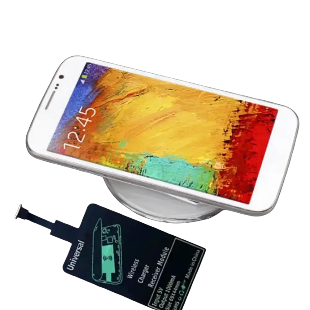 White smartphone on circular wireless charging pad with wireless charging receiver for android type c nearby