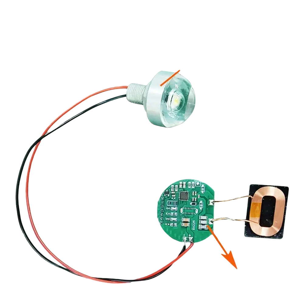A translucent green 5v light bulb with positive negative solder connected to a green wireless charging receiver module with negative solder pad output