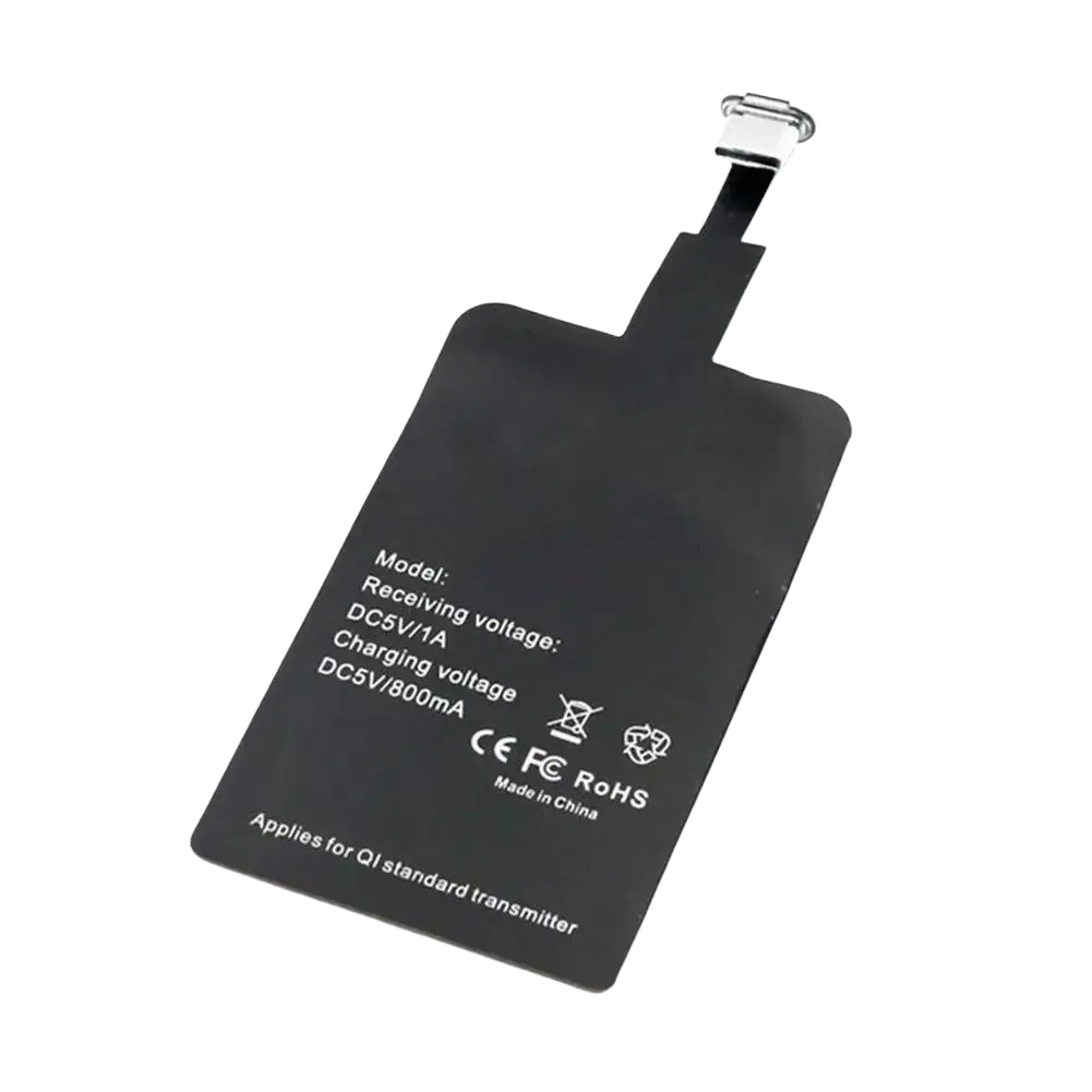 Black wireless charging receiver for type c android phones with metallic connector and white specification text on back side