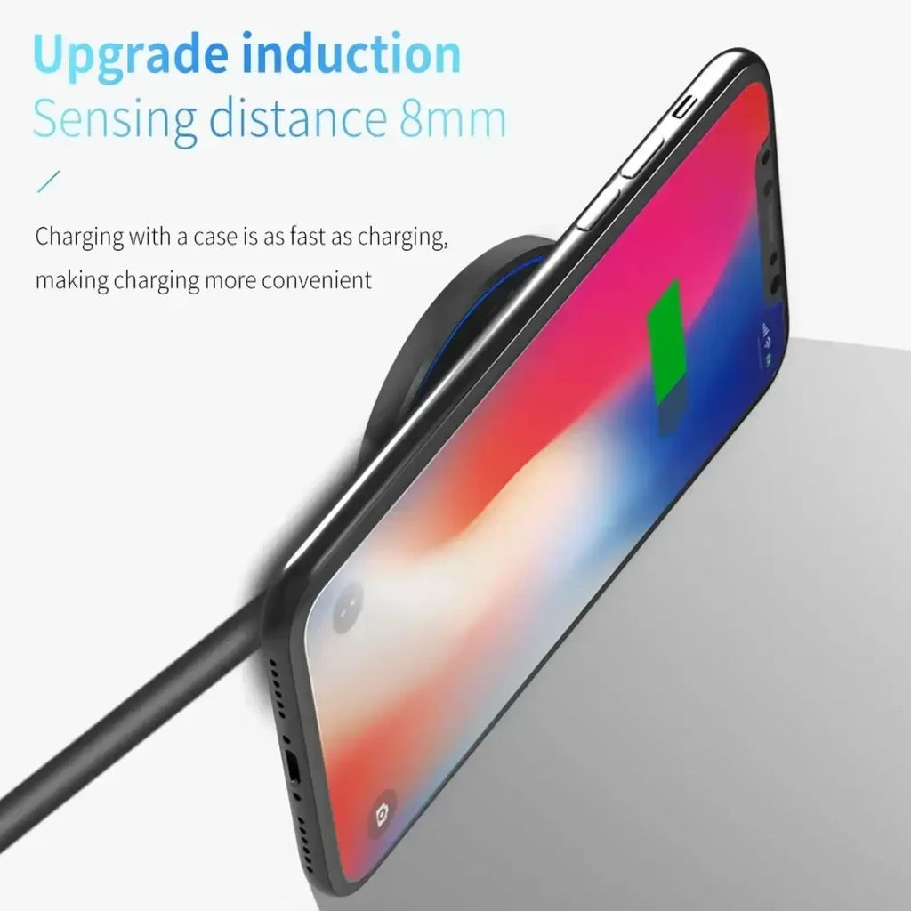 Black wireless fast charging pad with sleek minimalist design for phone watch and earphones charging