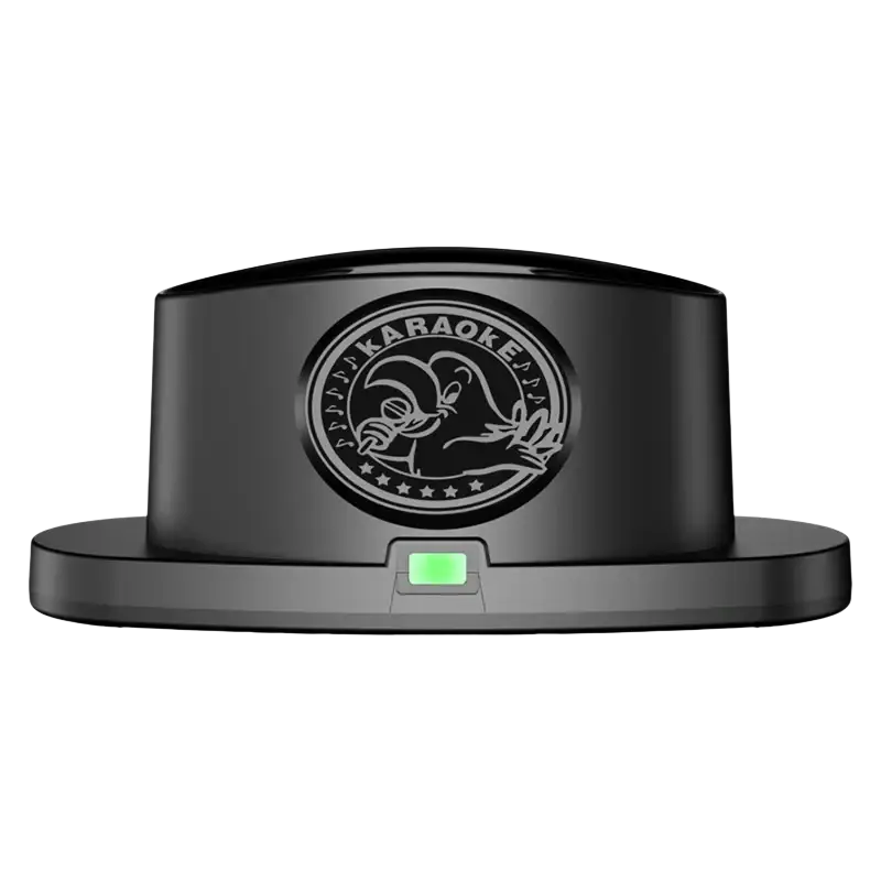 Black wireless karaoke microphone charging stand with dual dock and circular emblem featuring cartoon character and karaoke text