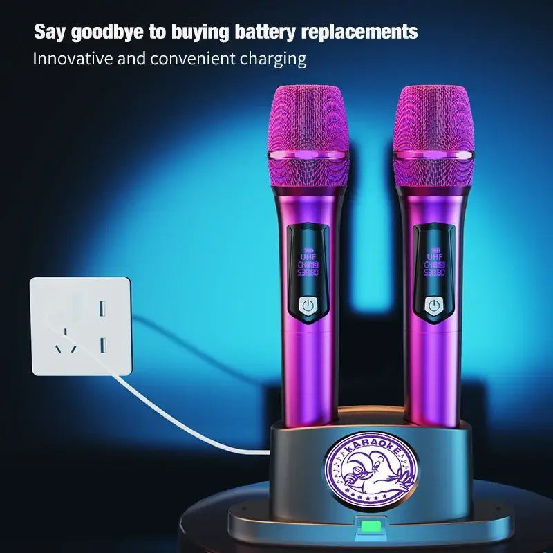 Two vibrant purple wireless karaoke microphones with metallic bodies on a dual dock charging stand