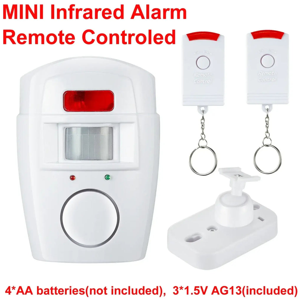 White mini infrared wireless motion sensor alarm system with red indicator light and two white remote controls with keychains