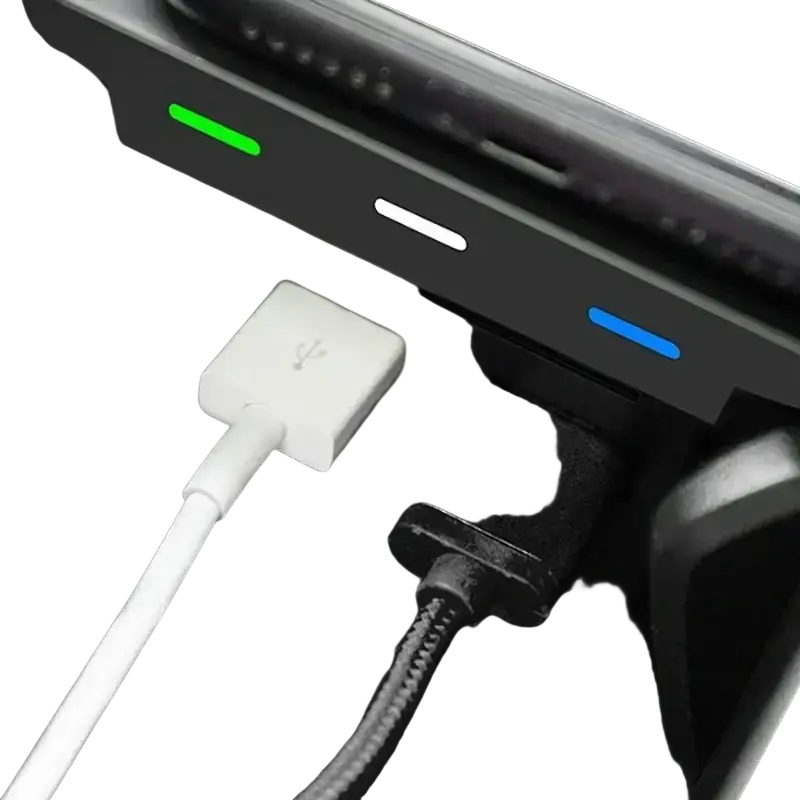 White usb-c phone charger cable plugged into black wireless phone charger for Volvo XC90 XC60 S90 with illuminated status indicators