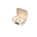 Cream-colored wireless sleeping earbuds with blue led indicators resting in a matching charging case showing 100% battery