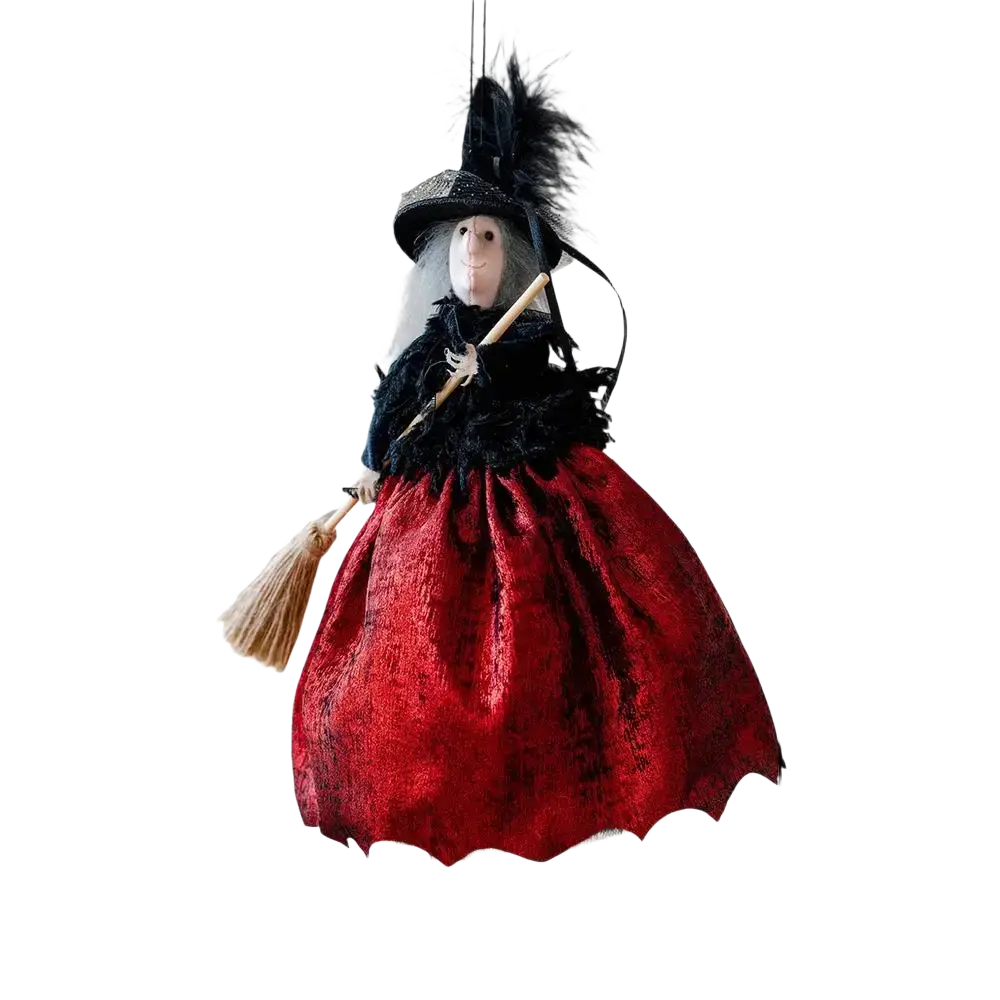 Witch doll halloween hanging tree ornament with black feathered hat white face and red velvet dress holding broomstick
