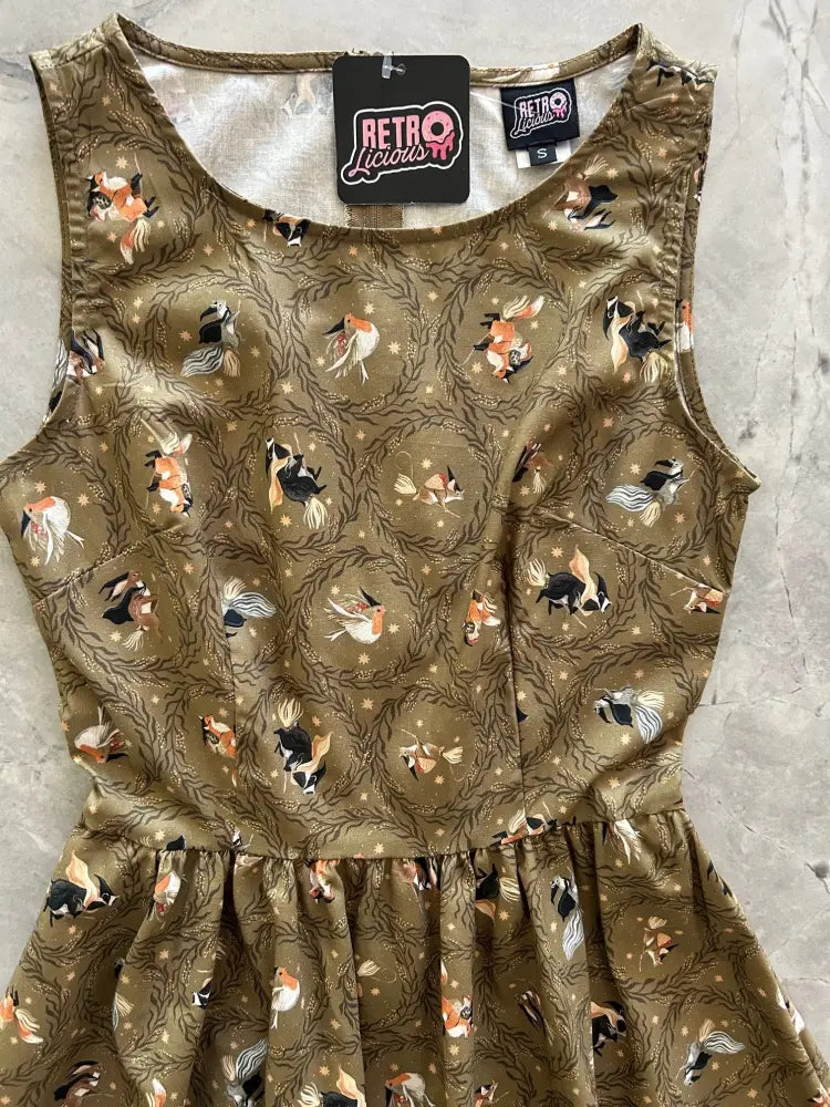 Witchy animals vintage cotton midi dress in olive green with a gathered waistline and bird and vine pattern