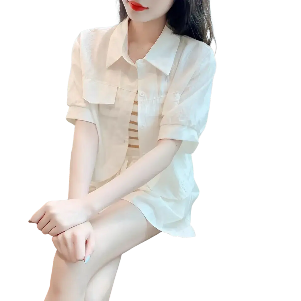 Off-white short-sleeved button-up shirt with collar and chest pockets in cotton blend women short sets for summer casualwear