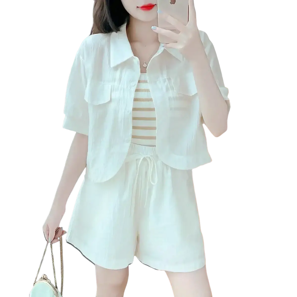 White short-sleeved denim jacket with collar and two front pockets in cotton blend casual summer outfit with button closure