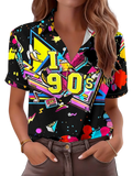 Women 90s graphic short sleeve button up shirt black with neon yellow pink and blue 90s-themed paint splashes and cassette tapes