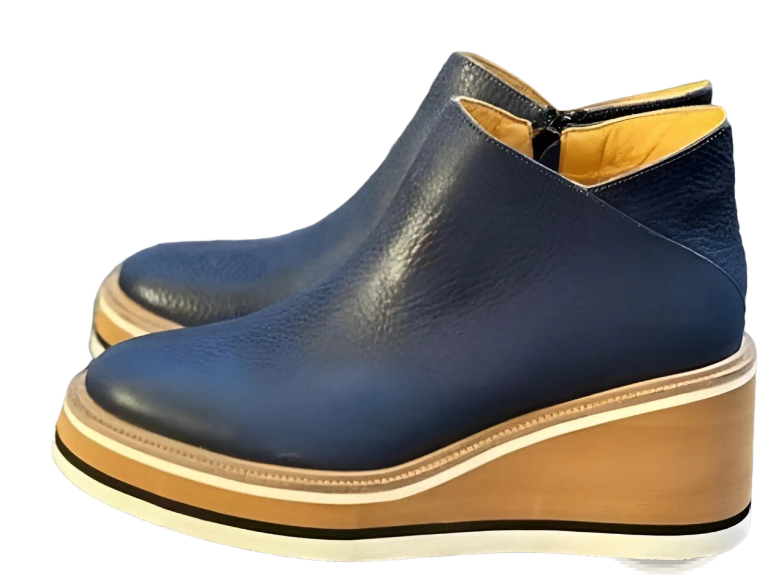 Dark blue leather women ankle boots with chunky tan and white platform wedge heels