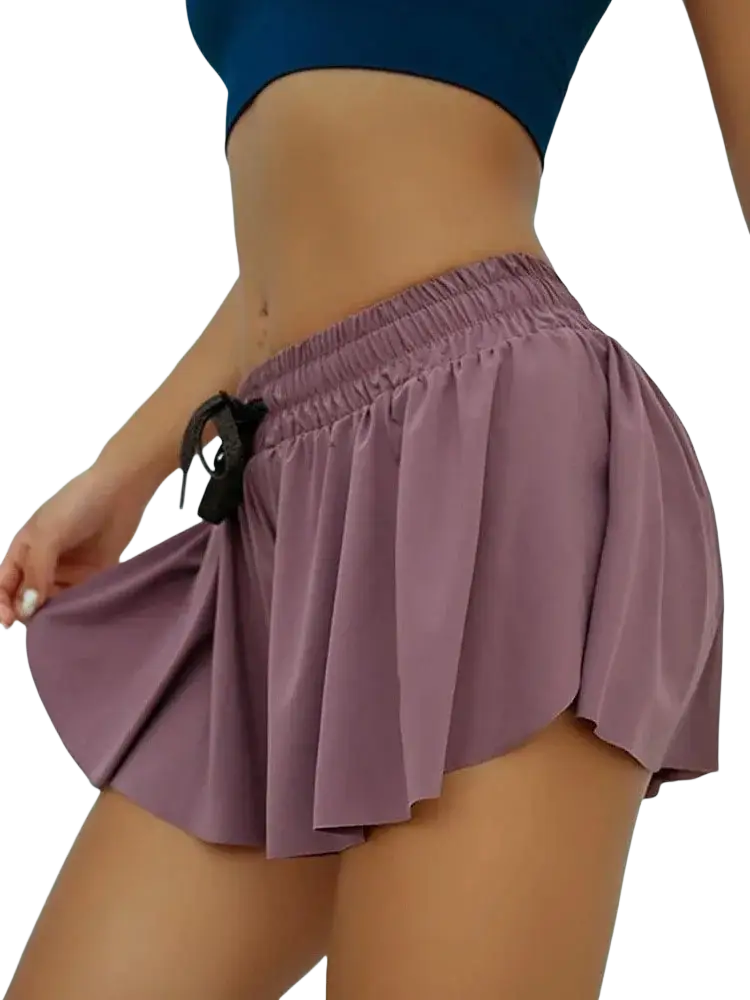 Women athletic pleated skort in lavender with quick dry fabric elastic waistband and black drawstring tie for sports use