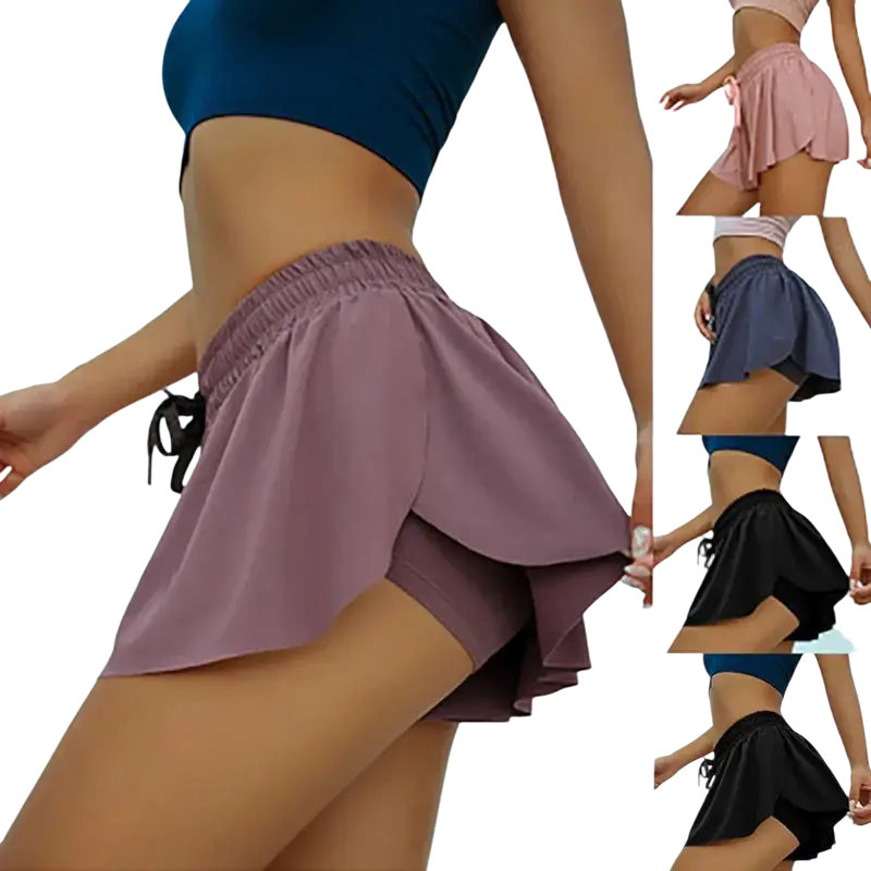 A mauve women athletic pleated skort with ruffled hem, elastic waistband, black drawstrings, and quick dry fabric