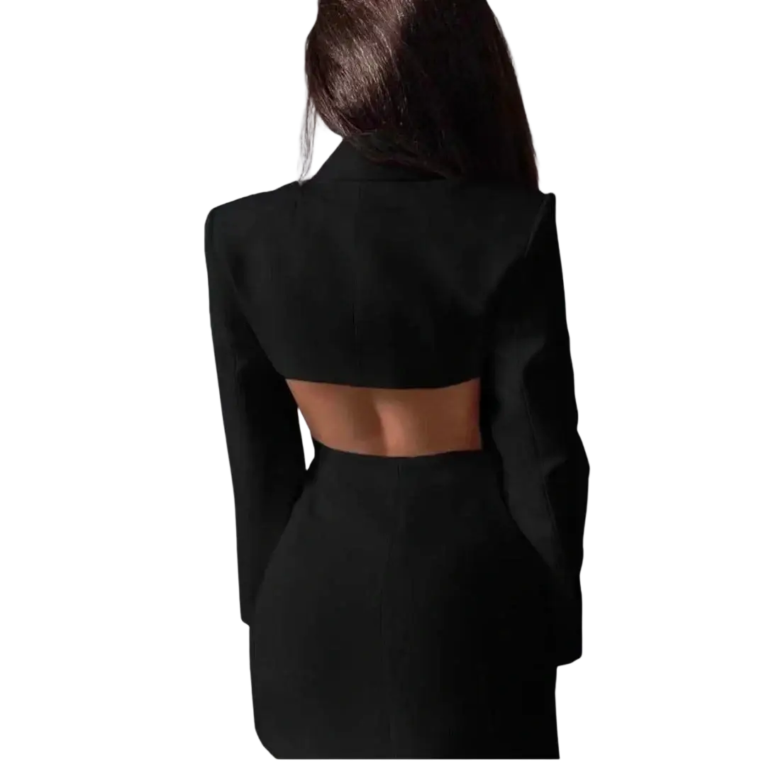 Black cropped double breasted blazer with long sleeves and a back cutout shown from the back side