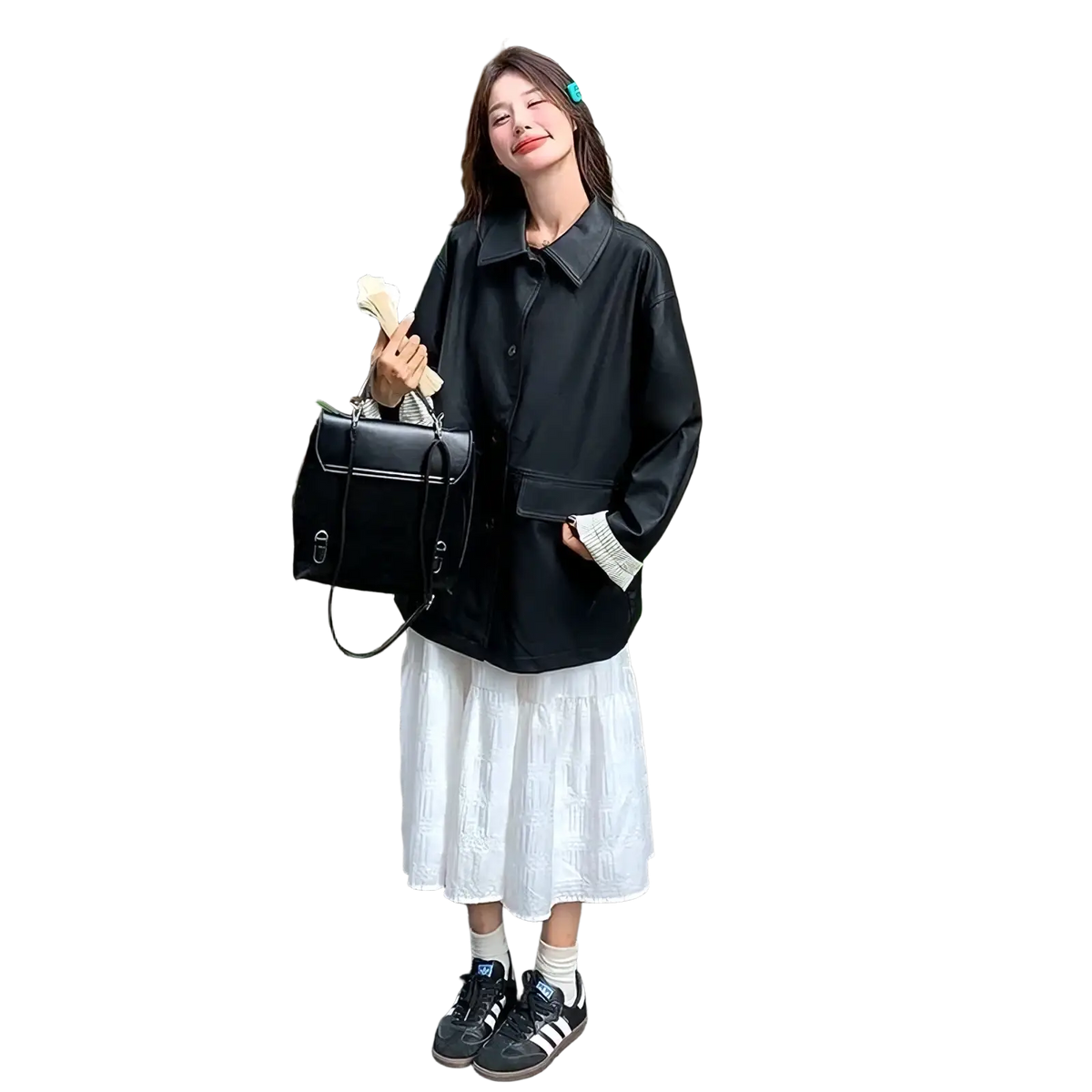 Black leather satchel with silver hardware and structured rectangular shape paired with women black leather jacket green ribbed cuffs