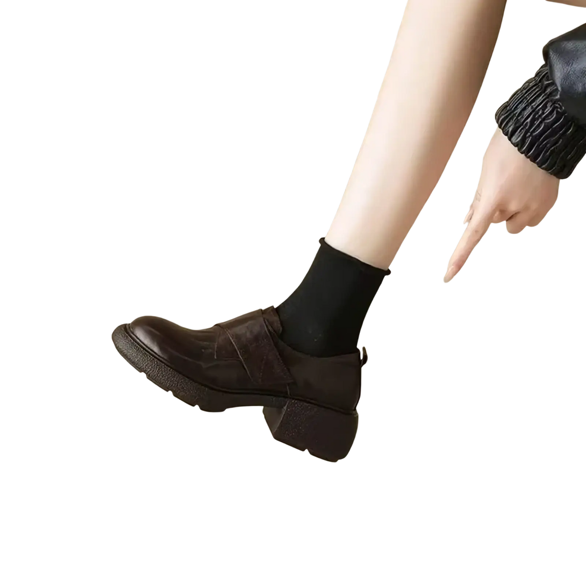 Women black leather platform loafers featuring dark brown leather lace-up oxford design with chunky heel and textured sole