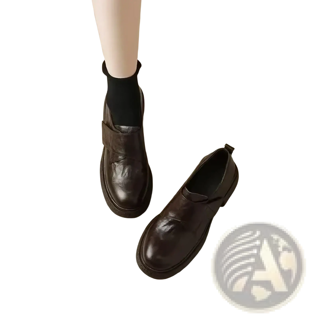 Women black leather platform loafers with dark brown slip-on design, chunky sole, and elastic strap