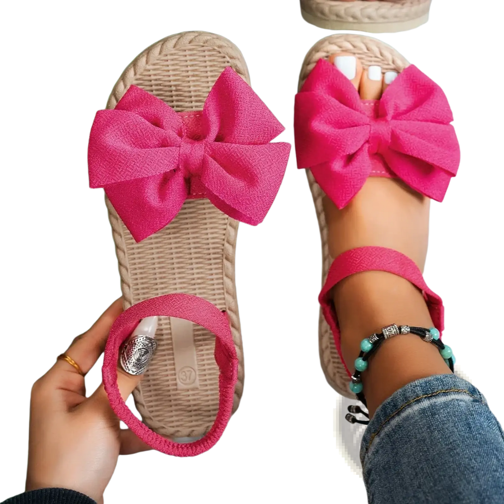 Bright pink woven espadrille sandals with a large fabric bow on the toe for women summer flat shoes