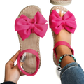 Bright pink woven espadrille sandals with a large fabric bow on the toe for women summer flat shoes