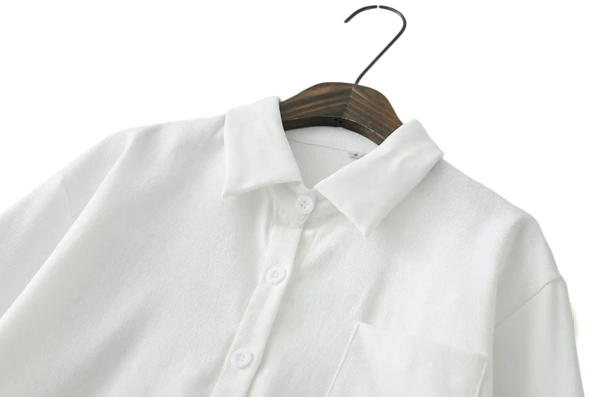 Women button down blouse long sleeve casual shirt in white with subtle texture and crisp collar hanging on wooden hanger