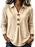 Beige women button up long sleeve blouse with wooden buttons and relaxed fit casual solid shirt front view
