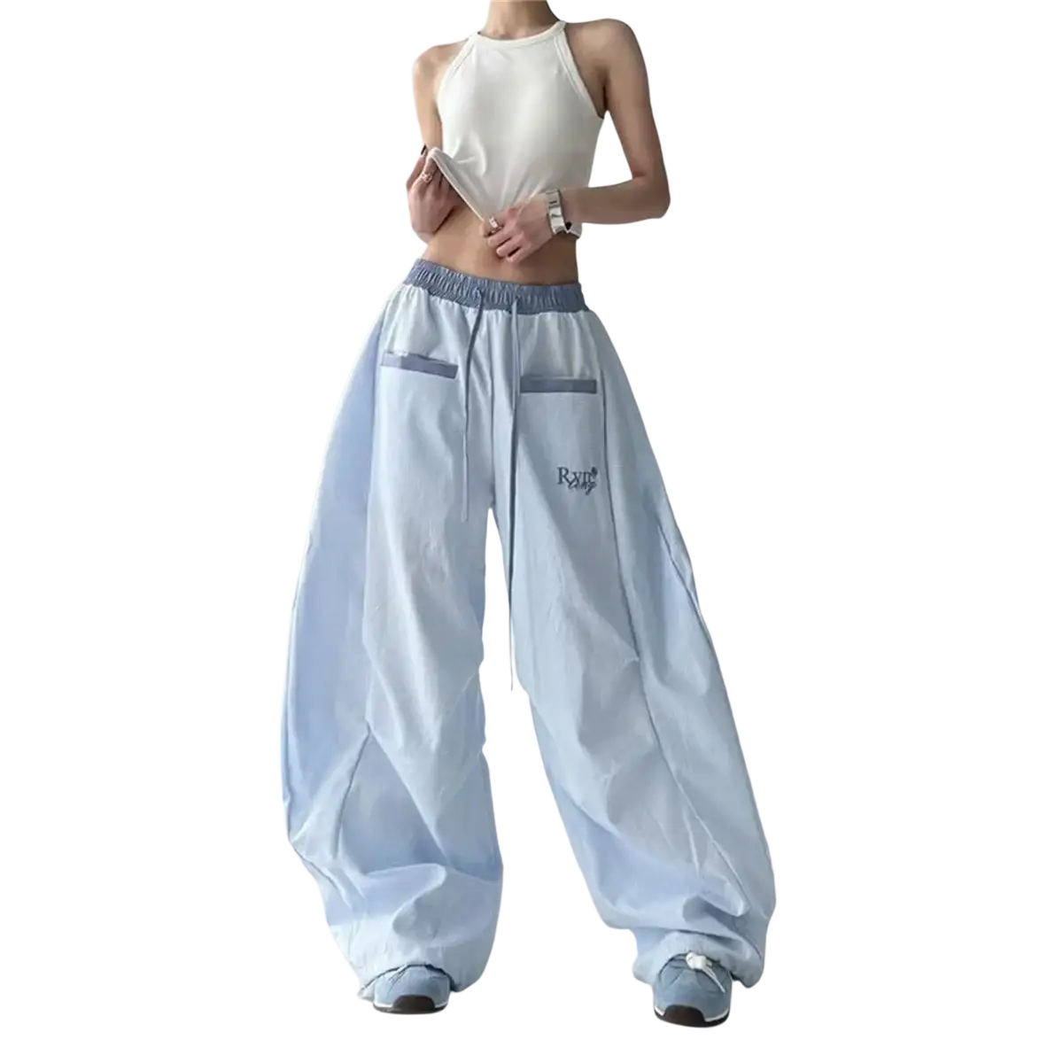 Light blue women cargo pants with wide leg, loose fit, drawstring waistband, and subtle gray pocket trim for streetwear