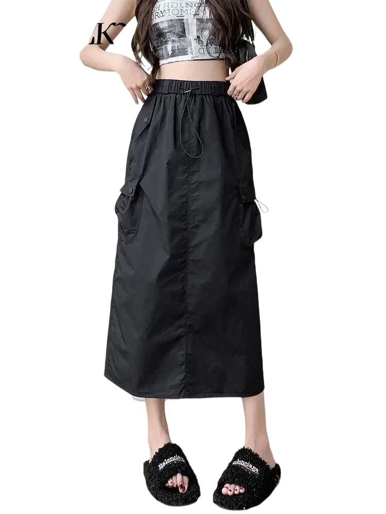 Black women cargo utility maxi skirt with multiple side pockets and drawstring waistband made of durable fabric