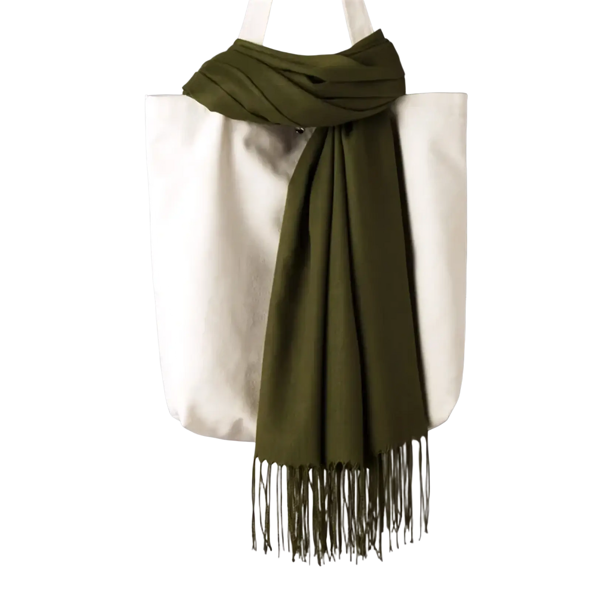 Olive green cashmere feel winter scarf shawl with fringe hanging over a white tote bag for women