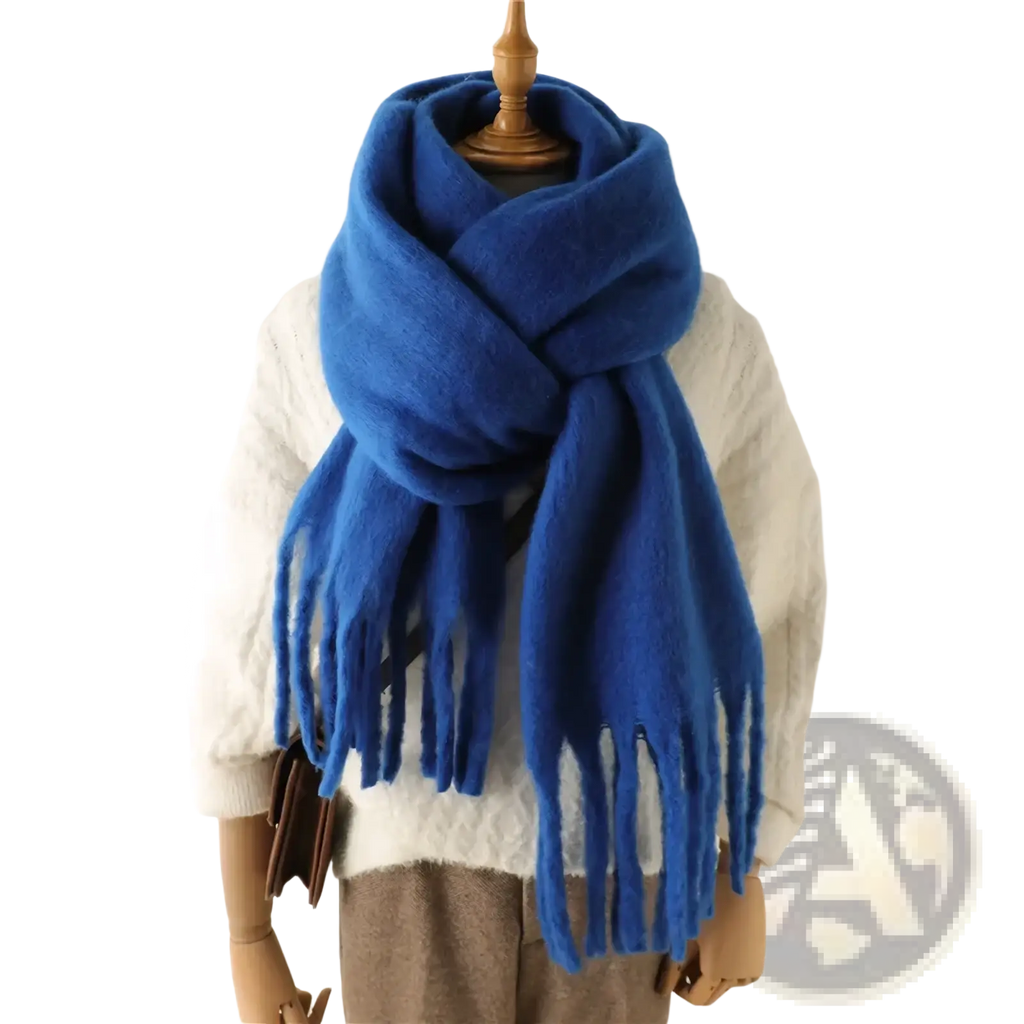 A plush royal blue cashmere feel winter scarf shawl with soft fringed ends for women