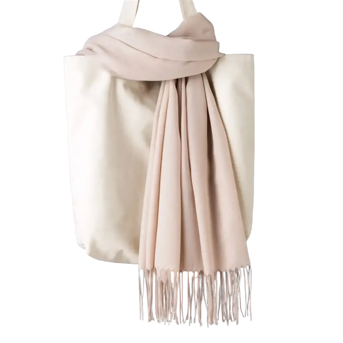 A soft blush pink cashmere feel winter scarf shawl with delicate fringe detailing for women