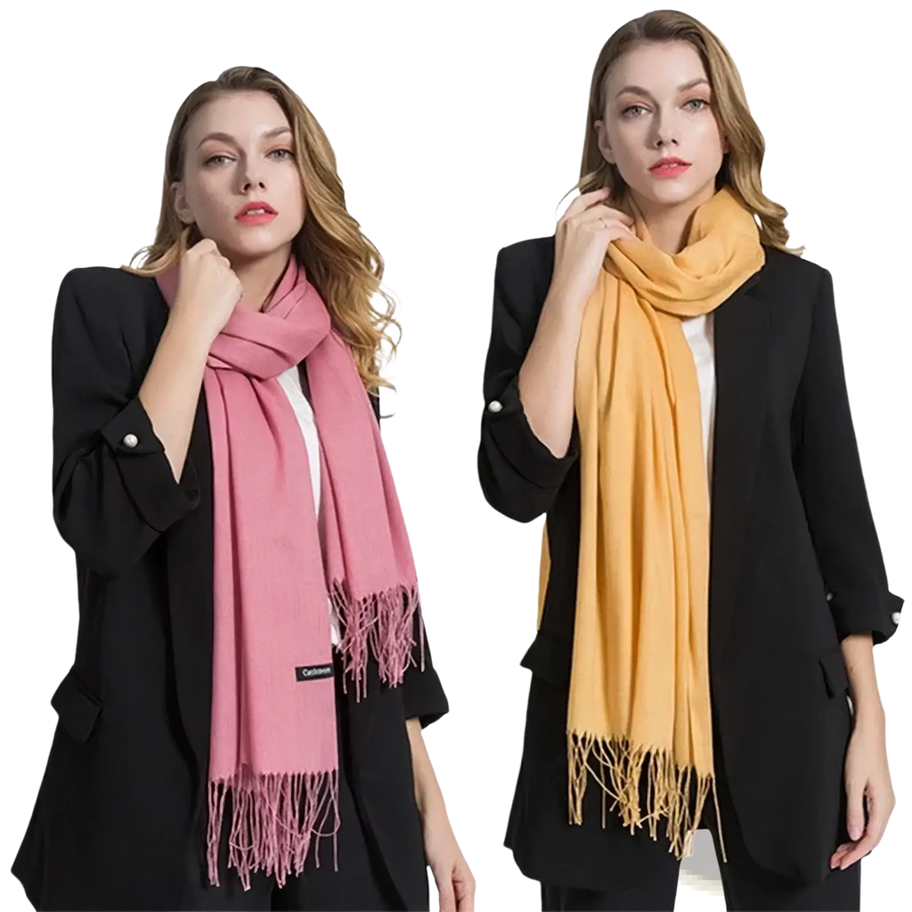 A soft women cashmere feel winter scarf shawl in solid pink or mustard yellow with delicate fringe detailing