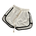 Women casual athletic shorts with drawstring waistband in white with black trim for comfortable sportswear