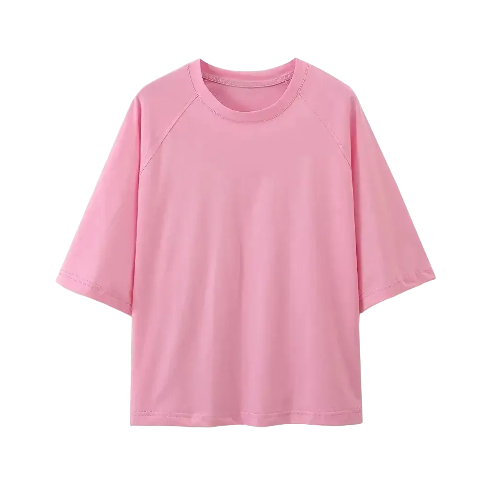 A soft pink oversized crew neck women casual short sleeve loose t shirt with subtle seam detailing