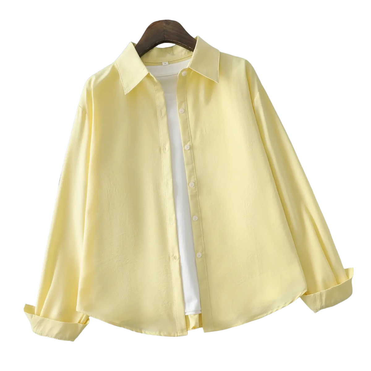 A pale yellow women cotton blend casual blouse with long sleeves button-up and rolled cuffs