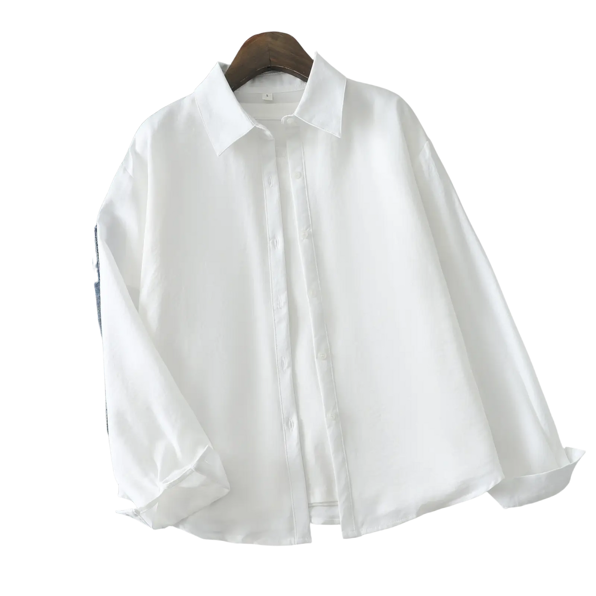 Women cotton blend long sleeve casual blouse in white with classic collar and neatly folded cuffs on wooden hanger