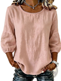 A soft pink lightweight linen blouse with round neckline and puffed sleeves for casual women’s wear