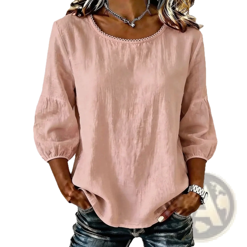 A soft blush pink lightweight linen women cotton casual long sleeve blouse with round neckline and puffed sleeves