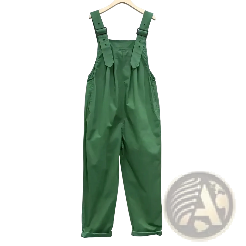 Women cotton dungaree jumpsuit in green canvas with adjustable shoulder straps and rolled cuffs