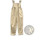 Beige women cotton dungaree jumpsuit with adjustable shoulder straps and rolled cuffs in overall pants style