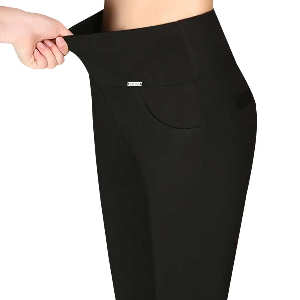 Women cotton high waisted leggings in black with smooth stretchy fabric and a subtle front pocket for workouts