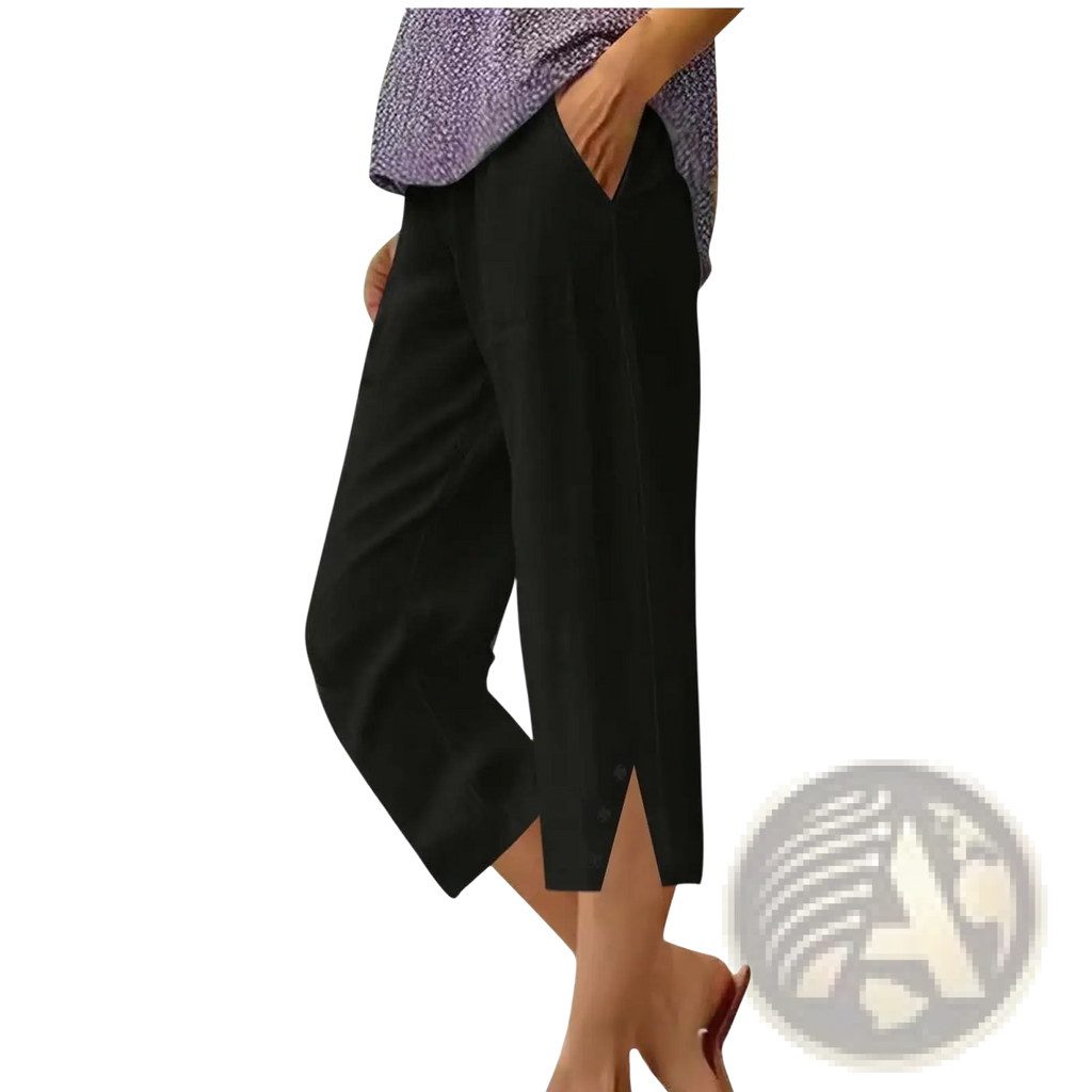 Black linen women cotton loose capri pants with pockets and relaxed fit featuring a subtle side slit