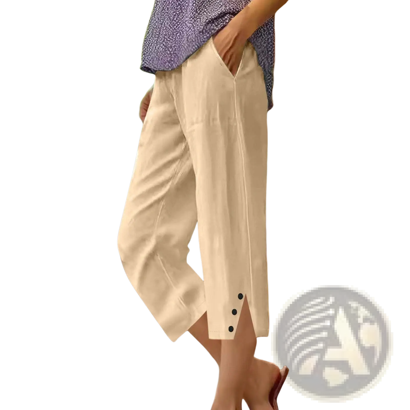 Women cotton loose capri pants in cream with black button accents at cuffs and side pockets in a relaxed fit
