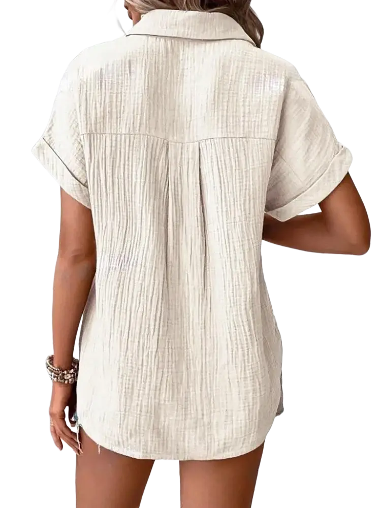 Beige textured cotton shirt dress with rolled sleeves and collar in a women cotton short sleeve button up shirt style