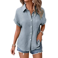 Women cotton short sleeve button up shirt in light blue textured fabric with rolled sleeves and front pocket